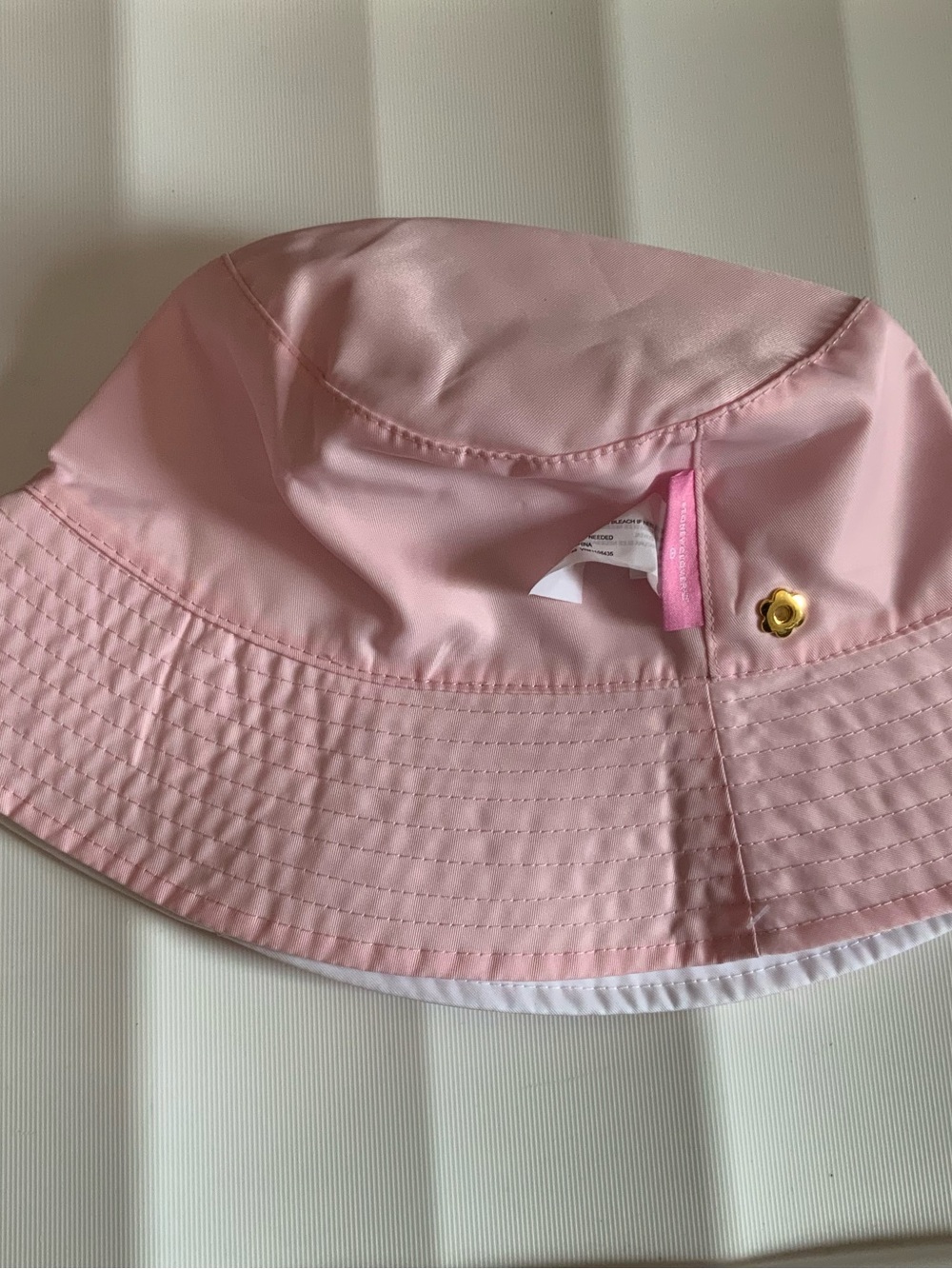 Stoney Clover Lane White/Pink Bucket Reversible Hat with Subtle Logo Tag